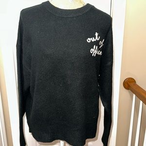 “Out of Office” sweater